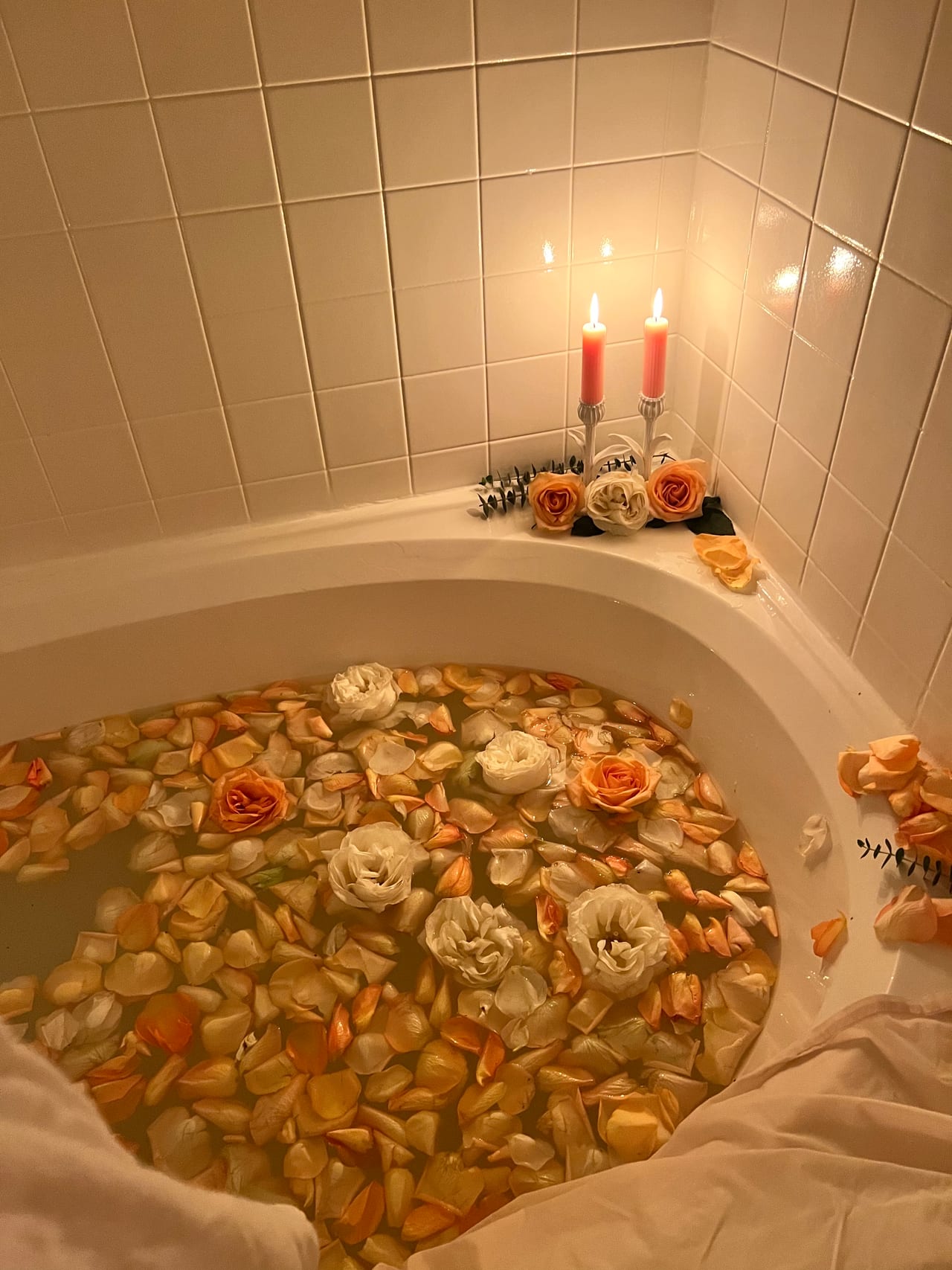 Ritual bath prepared with petals and warm water